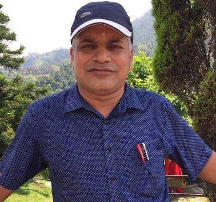 Dr. PB Adhikari
